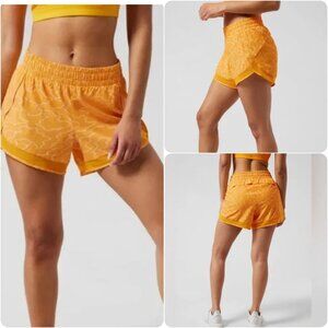 *ATHLETA* : Mesh Racer Shorts in Vapor Radiant Sunrise, size XXS.